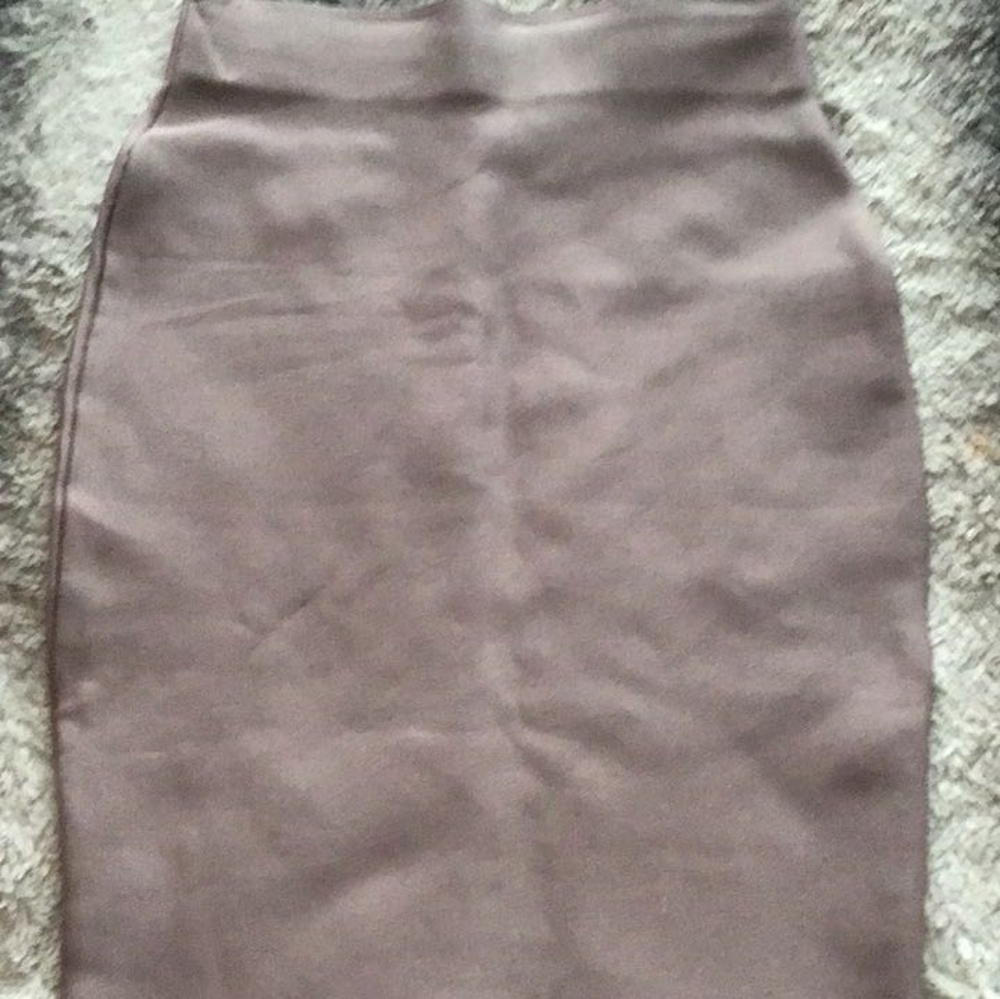 Beige skirt.